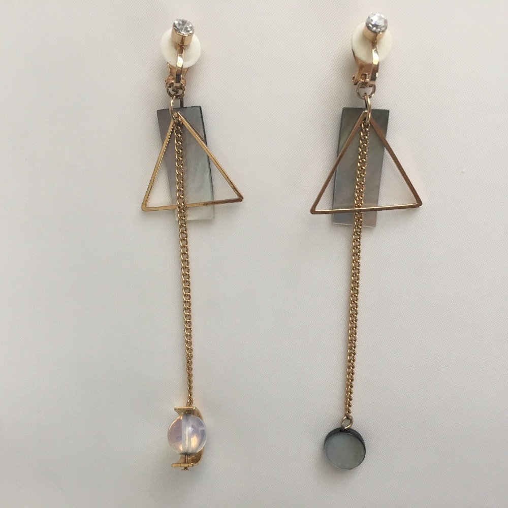 Gold-like asymmetrical Clip On Earrings